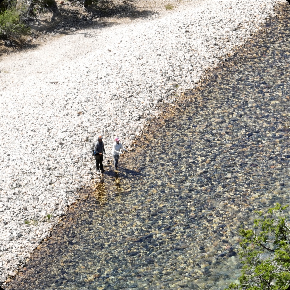 Angler on a gravel bar