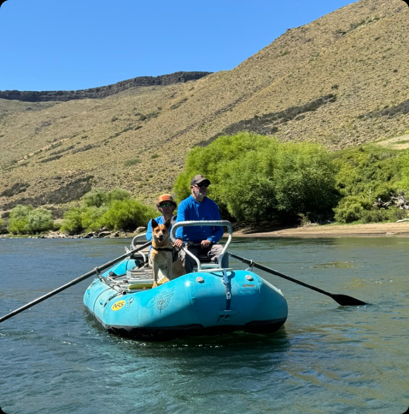 Drift boat working a wide river bend