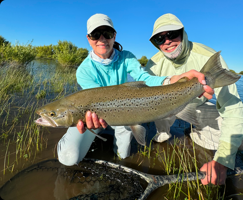 Two anglers together on the water